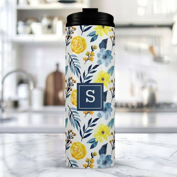 Floral Travel Tumbler With A Navy Blue Initial S.