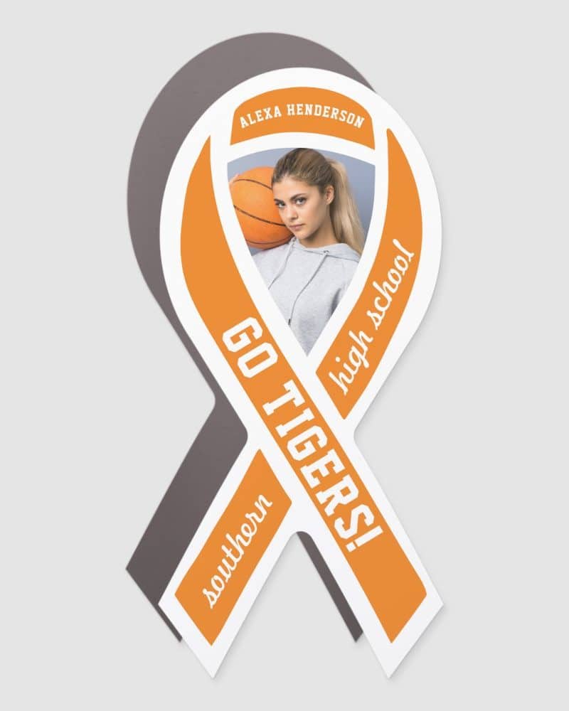 Orange ribbon sticker with a photo of a girl holding a basketball, "Go Tigers!" text, and "Southern high school" text.