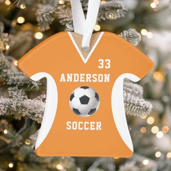 Orange Soccer Jersey-Shaped Christmas Ornament With The Name Anderson And Number 33, A Soccer Ball, And The Word Soccer.