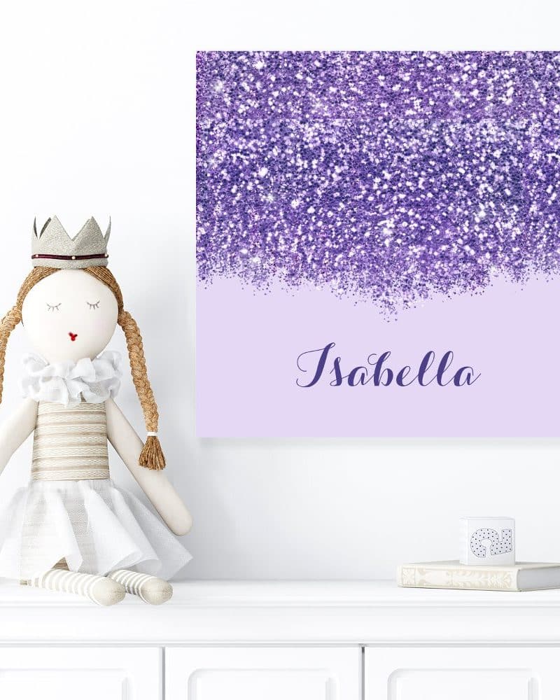 Purple glitter canvas with the name Isabella.