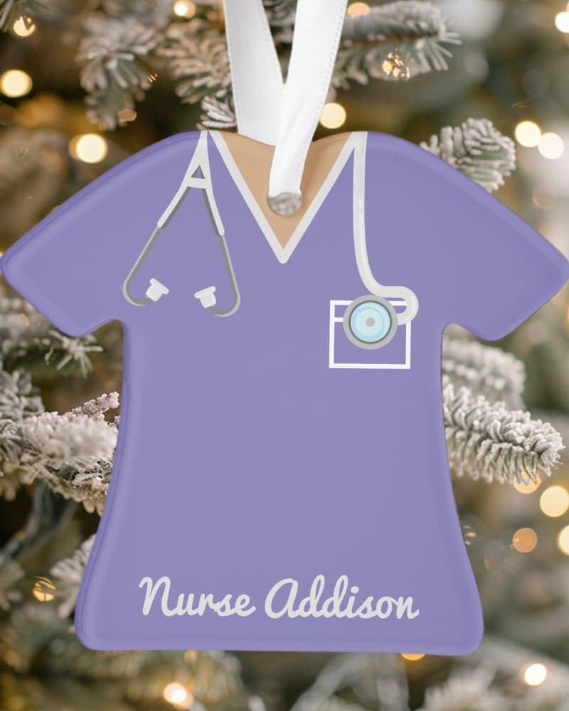 Purple nurse scrubs ornament with stethoscope and name Addison.