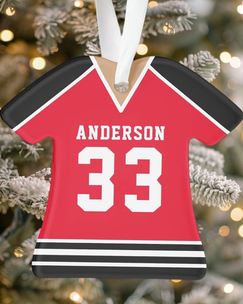 Red and black personalized jersey Christmas ornament with the name Anderson and number 33.