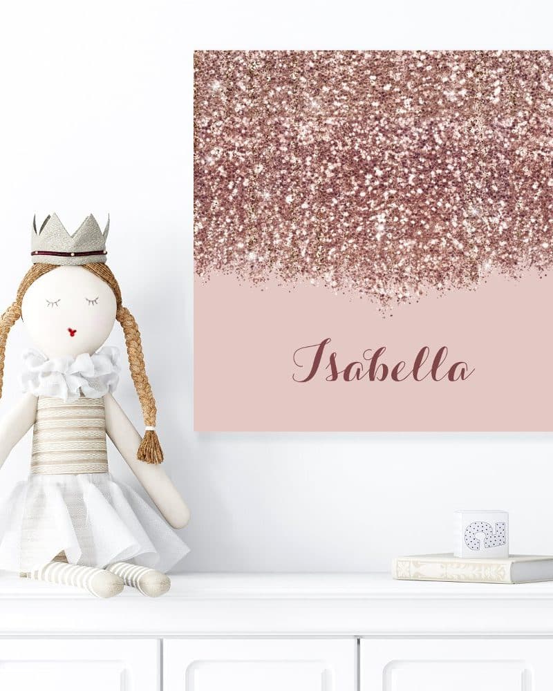 Rose gold glitter canvas with the name Isabella.