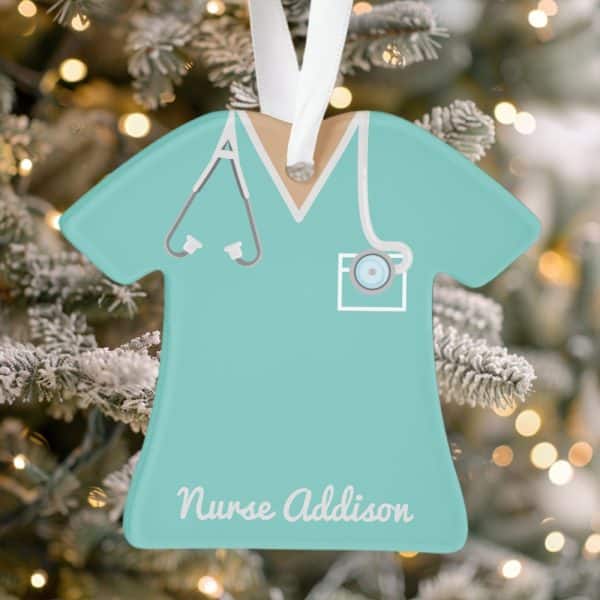 Teal Nurse Scrubs-Shaped Christmas Ornament With The Name Addison.