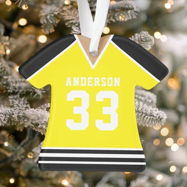 Yellow Hockey Jersey Ornament With The Name Anderson And Number 33.