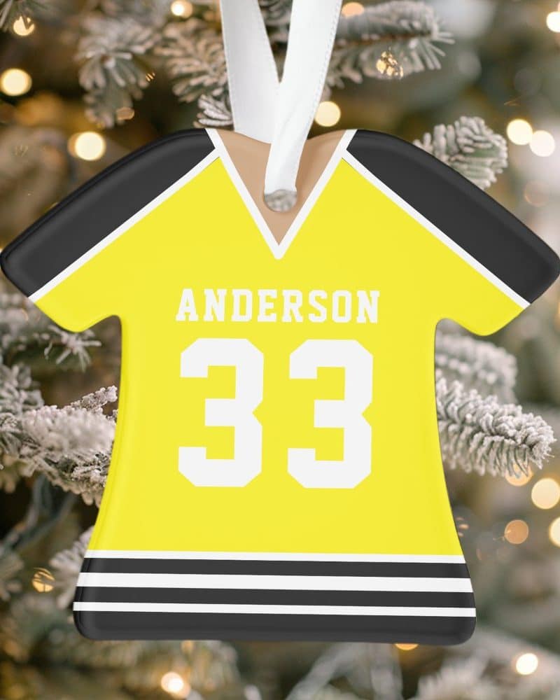 Yellow hockey jersey ornament with the name Anderson and number 33.