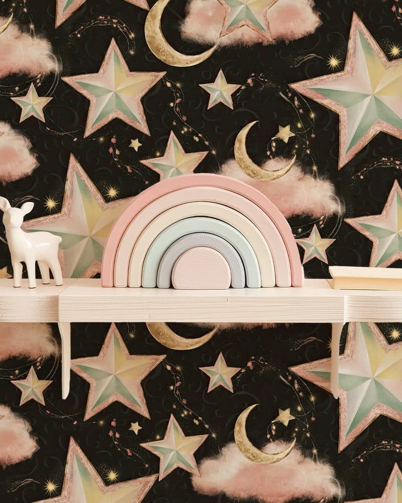 A pastel rainbow wooden toy sits on a shelf against a dark background featuring a whimsical star and crescent moon pattern.