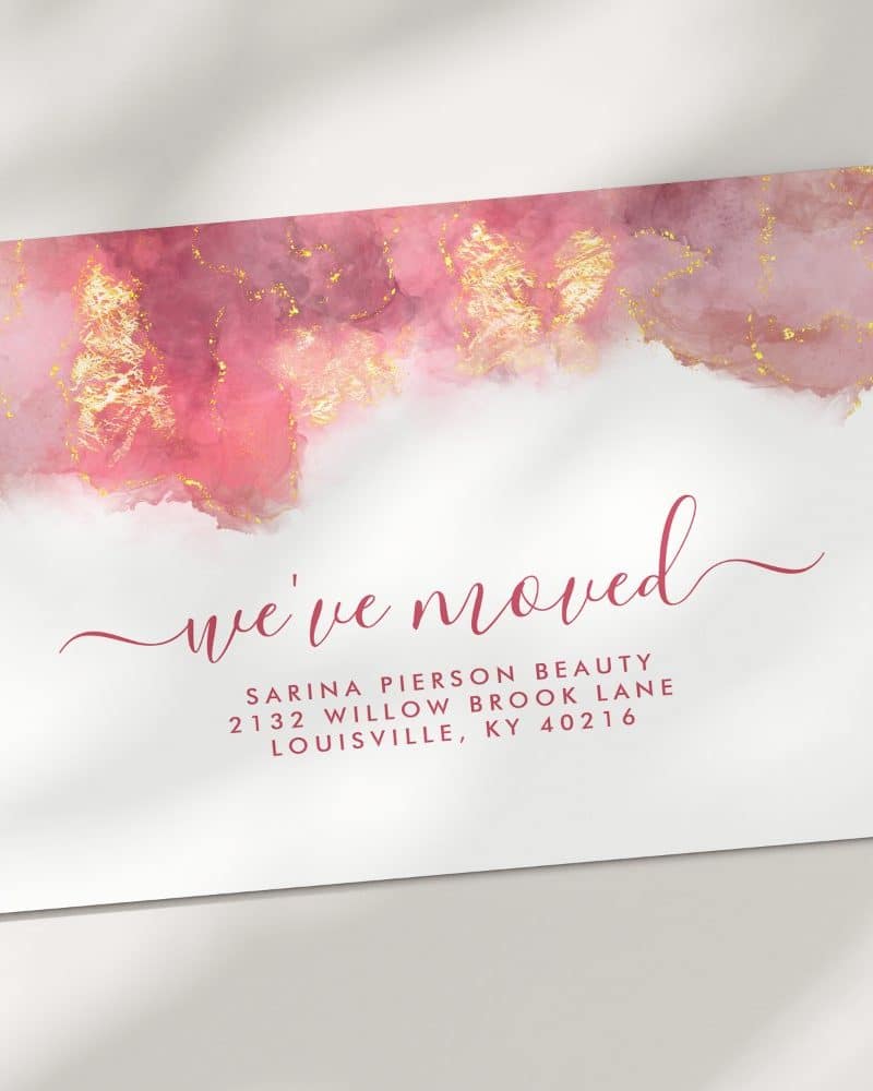 A moving announcement card with a pink and gold watercolor design. The text announces a move for Sarina Pierson Beauty.