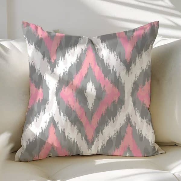 Pink And Gray Ikat Patterned Throw Pillow.