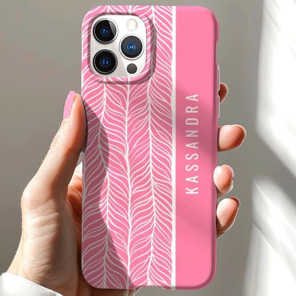 Pink Phone Case With A White Leaf Pattern And The Name Kassandra On The Side.