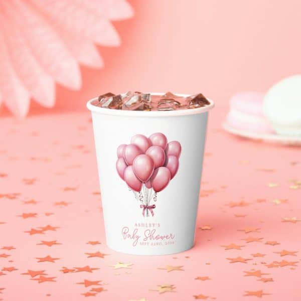 A Disposable Cup With Ice, Decorated With Pink Balloons And Ashley'S Baby Shower Details.