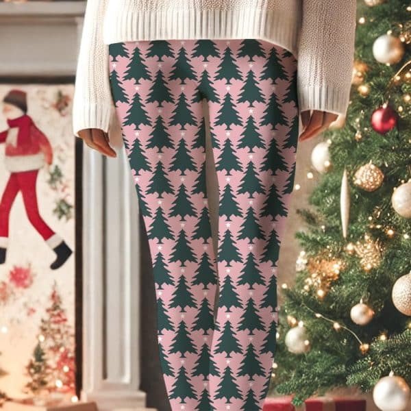 Pink Leggings With A Repeating Pattern Of Dark Green Christmas Trees And Small White Stars.
