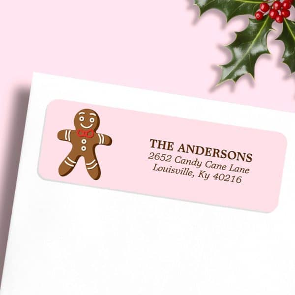 Pink Return Address Label With A Gingerbread Man And The Andersons' Address.