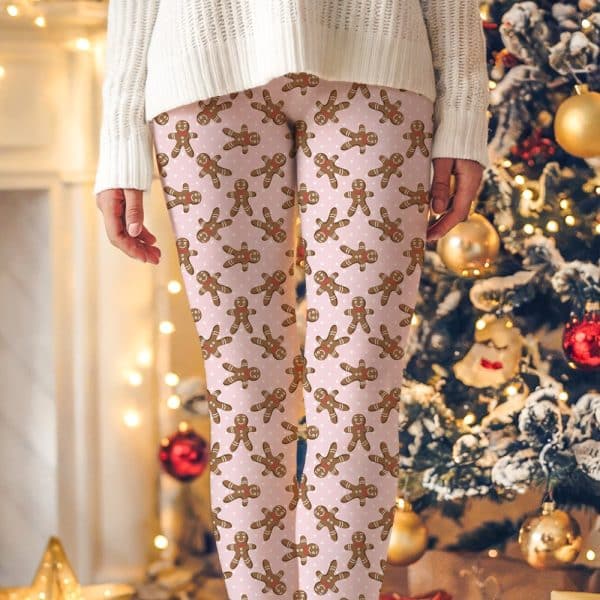 Pink Leggings With A Repeating Pattern Of Gingerbread Men.