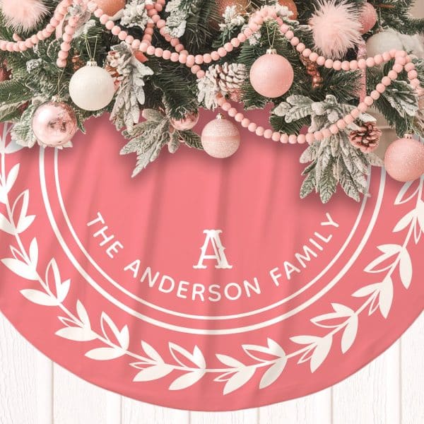 Pink Christmas Tree Skirt With A White Circle Design Featuring The Anderson Family Name And Initial A.