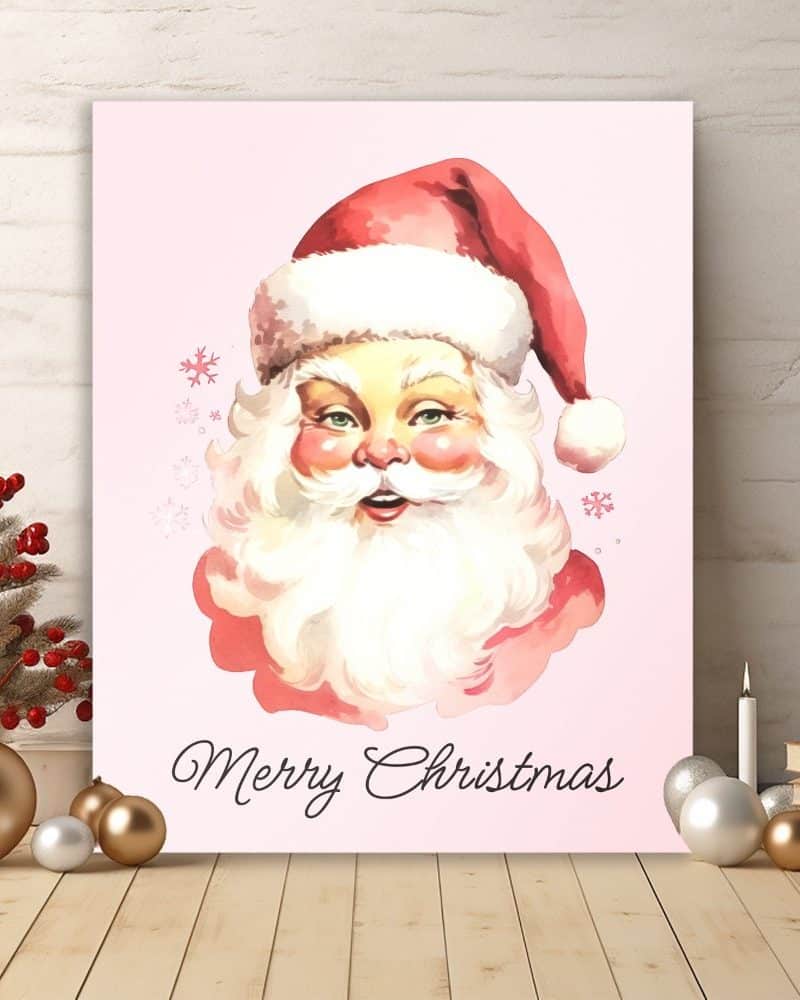 Pink Christmas print featuring a watercolor Santa Claus face and the words Merry Christmas.