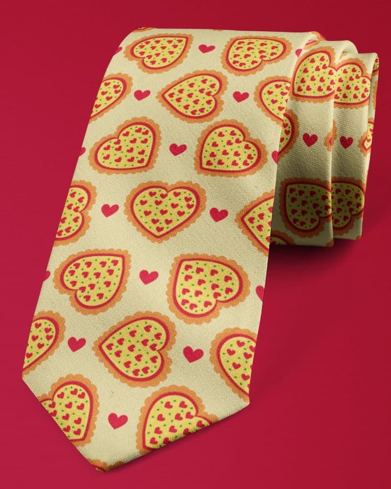 Necktie with heart-shaped pizza pattern.