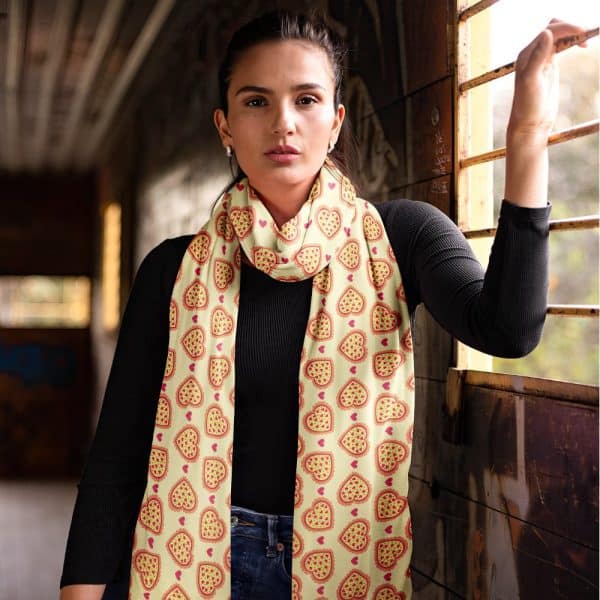Woman Wearing A Long Yellow Scarf With A Pizza Slice Heart Pattern.