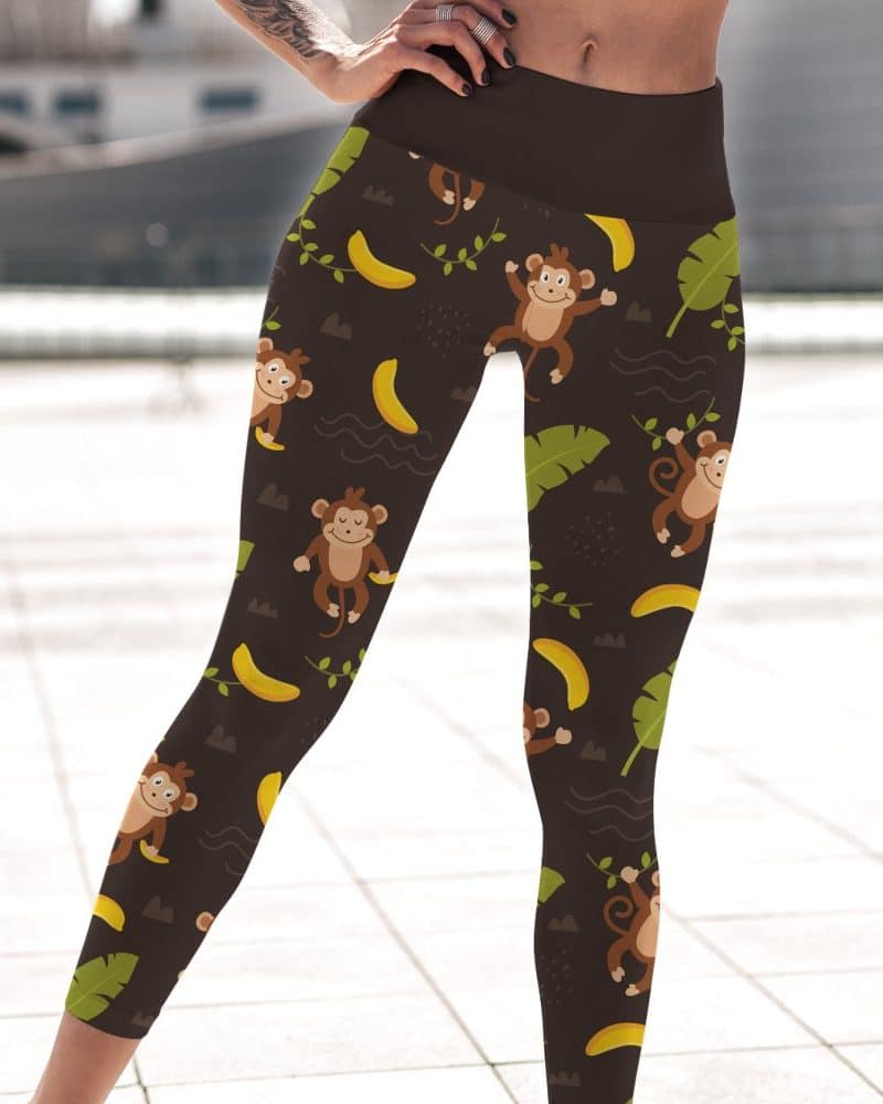 Brown leggings with a playful pattern of monkeys and bananas.
