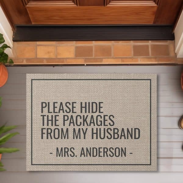 Beige Doormat With The Text Please Hide The Packages From My Husband Mrs. Anderson.