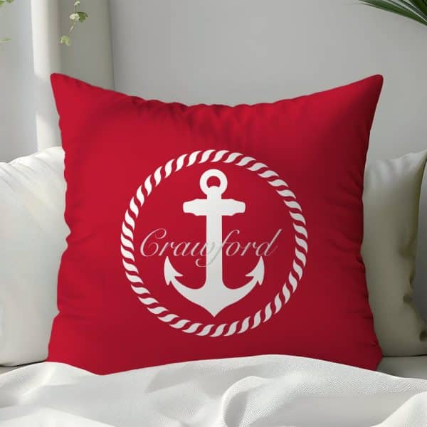 Red Pillow With A White Anchor And The Name Crawford In A Rope Circle.