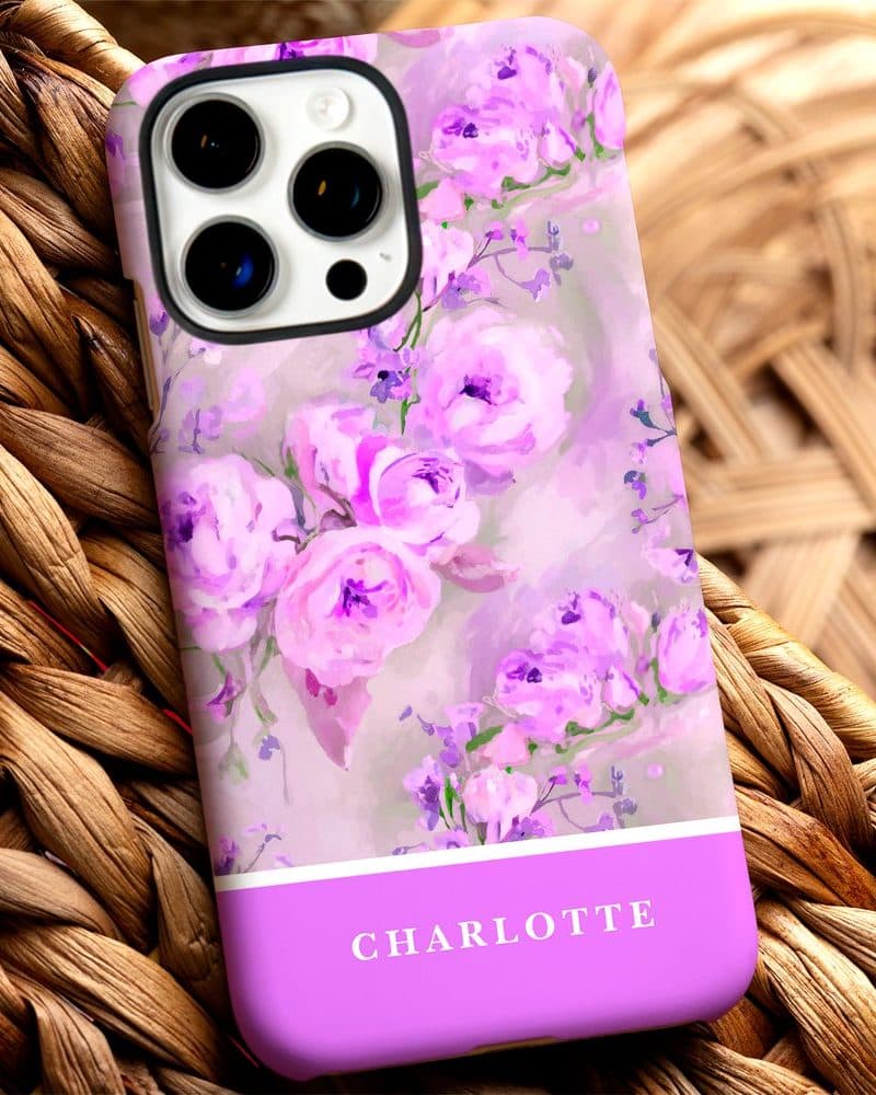 Purple phone case with a watercolor floral design and the name Charlotte.