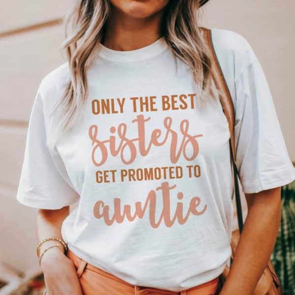 Woman Wearing A White T-Shirt That Says Only The Best Sisters Get Promoted To Auntie.