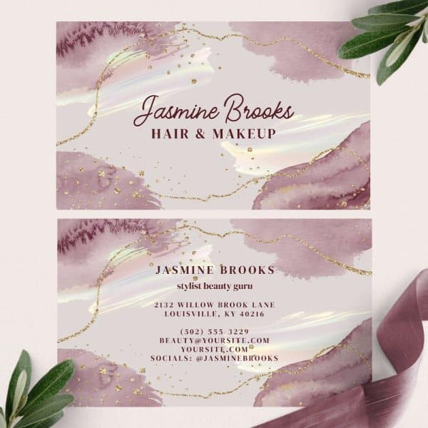 Two Business Cards For Jasmine Brooks, Hair And Makeup Stylist, Featuring A Watercolor Design In Shades Of Mauve And Gold.