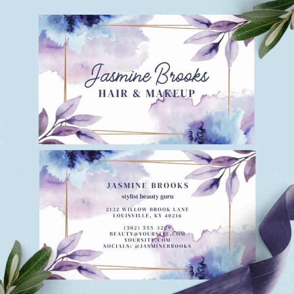 Two Watercolor Business Cards For Jasmine Brooks, Hair And Makeup Stylist. Purple And Blue Floral Designs Frame The Contact Information.