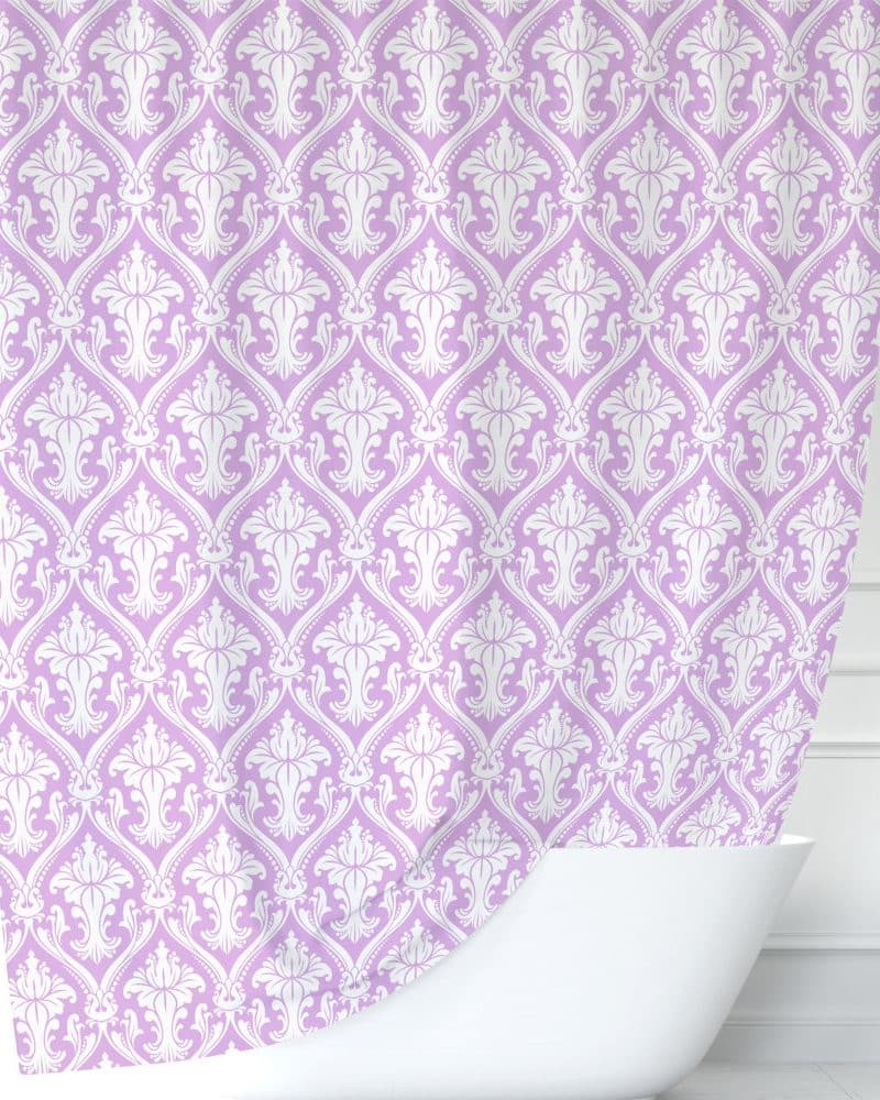 Lavender shower curtain with a white damask pattern.