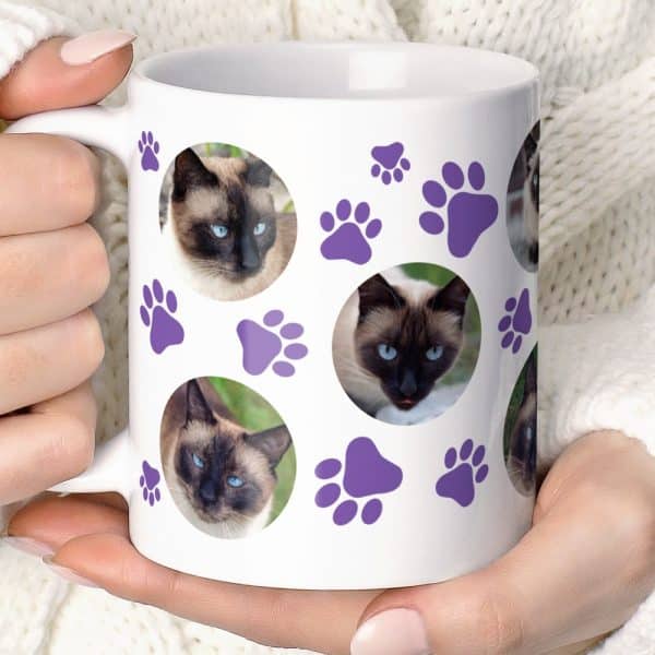 White Coffee Mug With Pictures Of Siamese Cats And Purple Paw Prints.