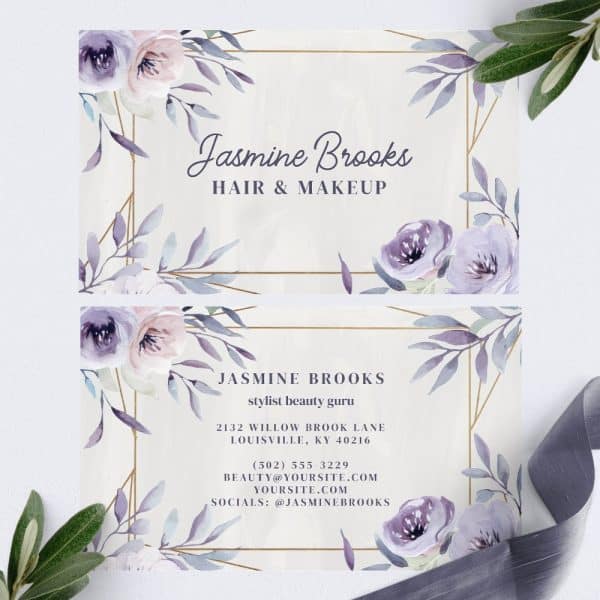 Two Elegant Business Cards For Jasmine Brooks, Hair And Makeup Stylist, Featuring Watercolor Floral Designs In Shades Of Purple And Gold Geometric Accents.