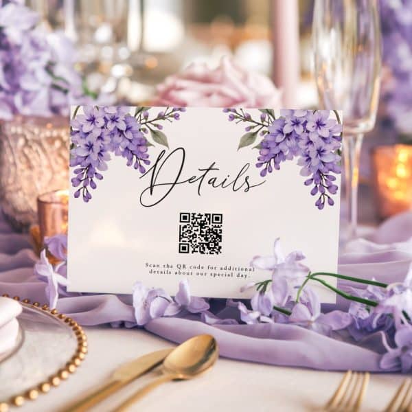 Wedding Details Card With Purple Floral Accents And A Qr Code.