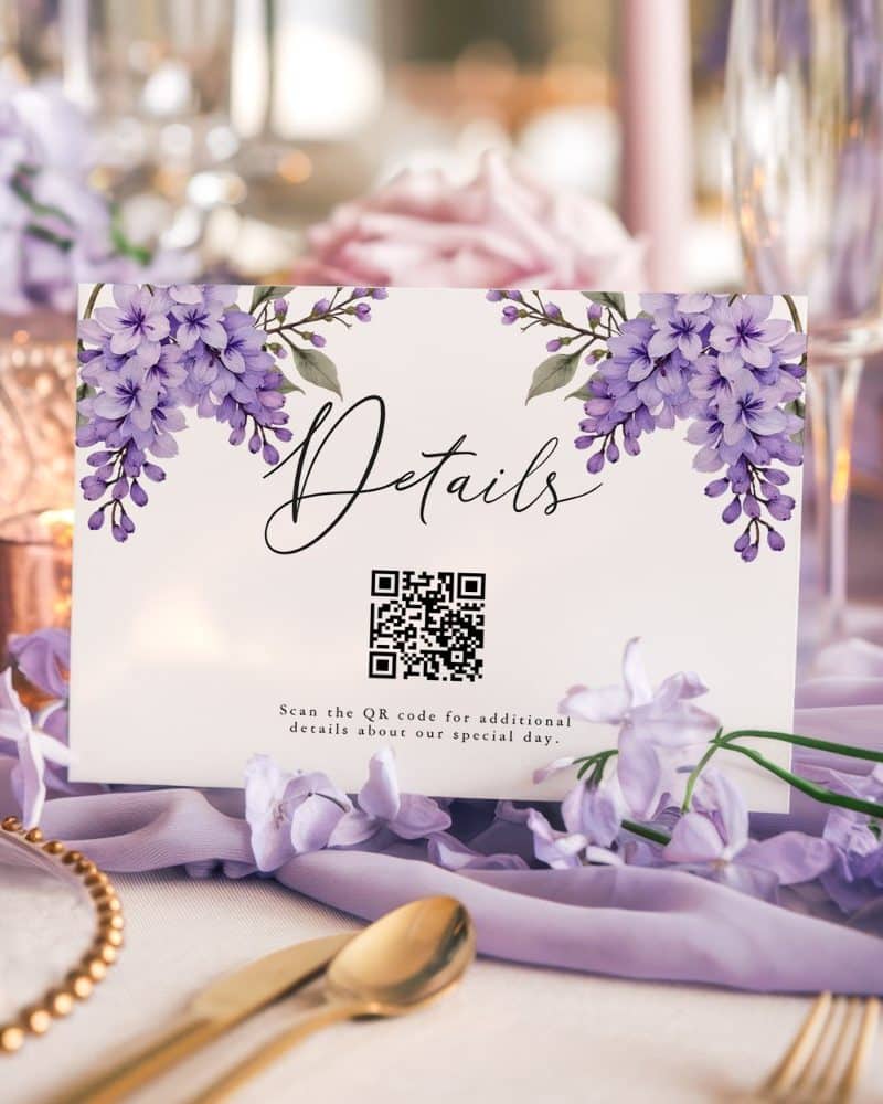 Wedding details card with purple floral accents and a QR code.