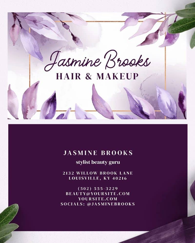 Business card for Jasmine Brooks, hair and makeup stylist, featuring watercolor purple leaves.