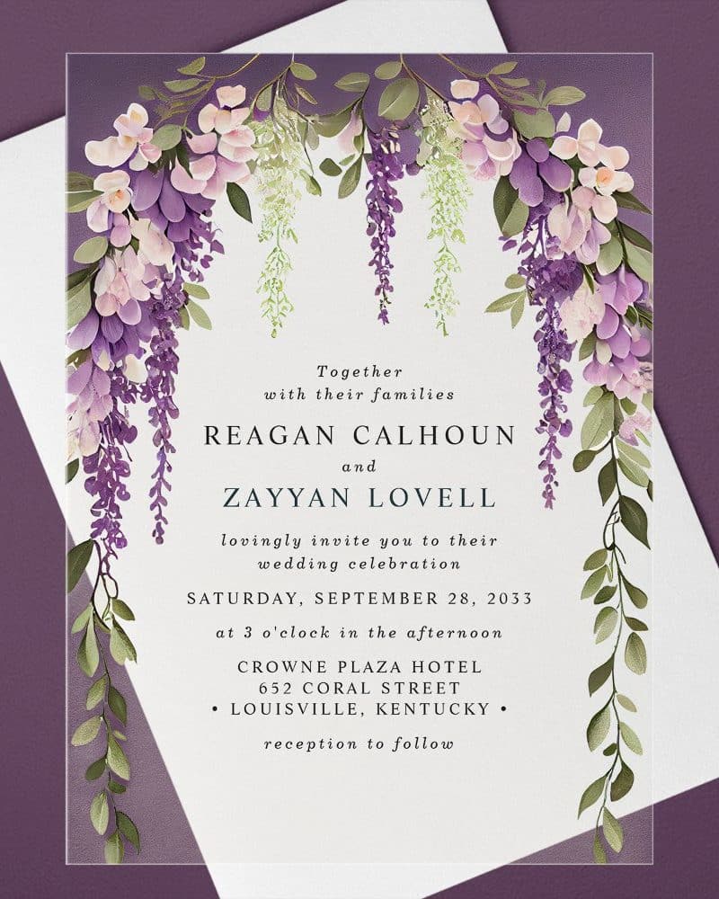 Wedding invitation with purple wisteria floral border.