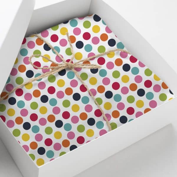 Gift Box With Colorful Polka Dot Wrapping Paper Tied With Twine.