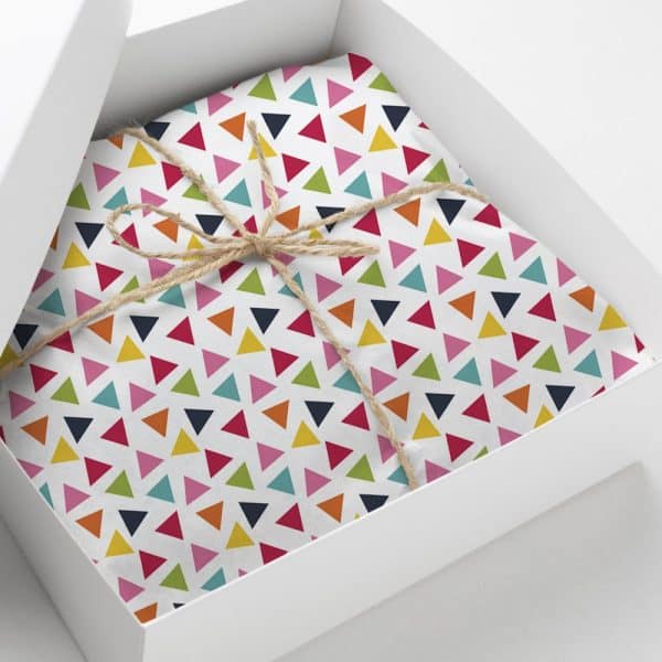 Gift Box With Colorful Triangle Patterned Wrapping Paper Tied With Twine.