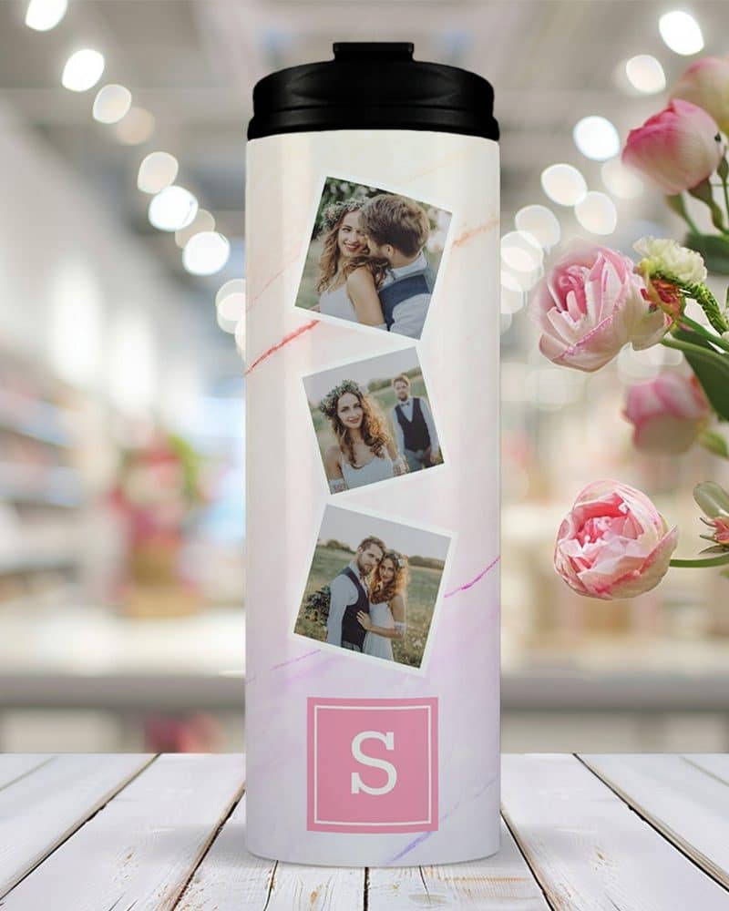 Personalized travel tumbler with three photos of a couple and the initial S.