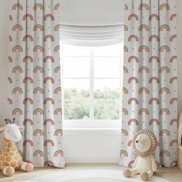 Pair Of Children'S Curtains Featuring A Multicolored Rainbow Pattern On A Light Background.
