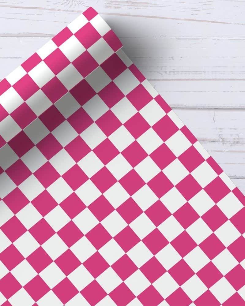 Pink and white checkered wrapping paper roll.