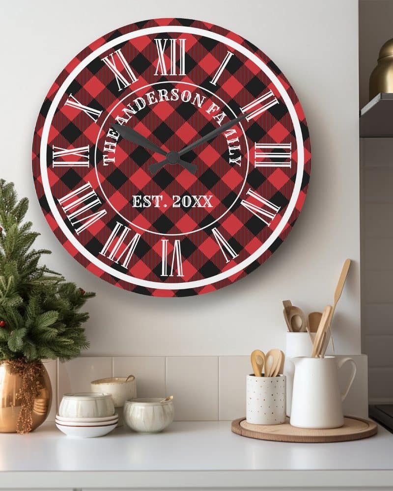 Red and black buffalo plaid clock with Roman numerals and a personalized family name and establishment date.