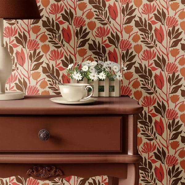 A Teacup And Saucer Sit On A Dark Brown Wooden Bedside Table, In Front Of A Floral Wallpaper.