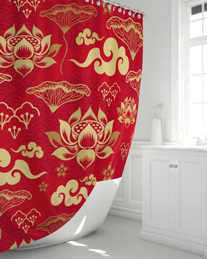 Red shower curtain with gold lotus flower and cloud pattern.