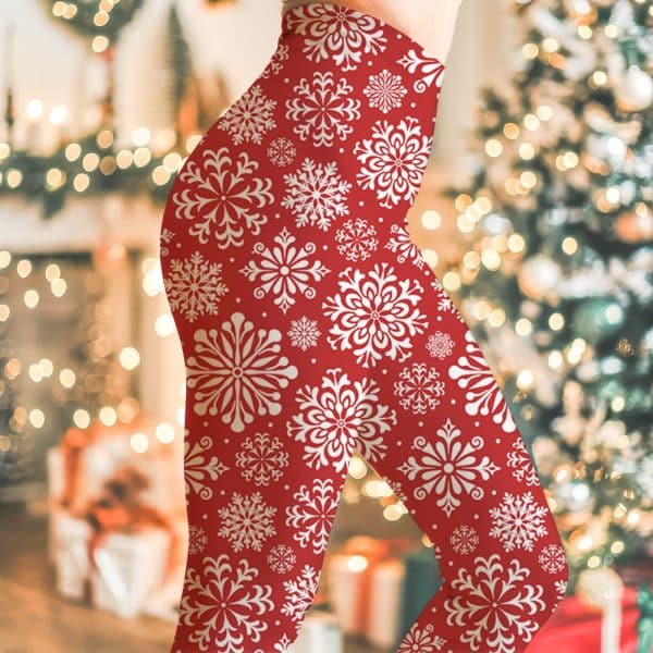 Red Leggings With A White Snowflake Pattern.