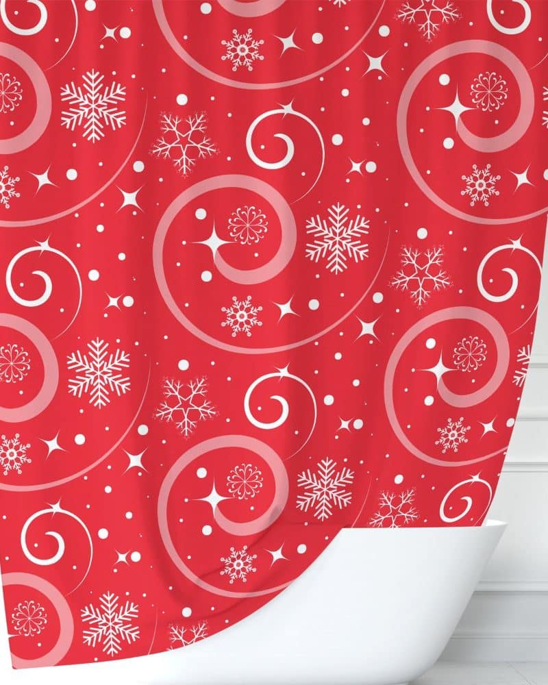 Red shower curtain with a white snowflake and swirl pattern.