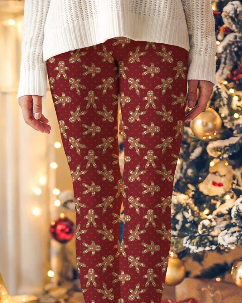 Red leggings with a repeating pattern of gingerbread men.