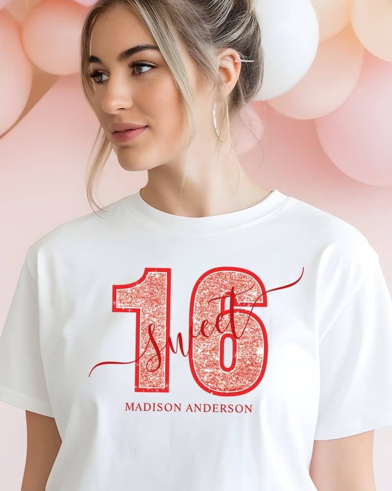 Woman wearing a white t-shirt with red glitter sixteen and the words Sweet Sixteen. The name Madison Anderson is printed below the number.