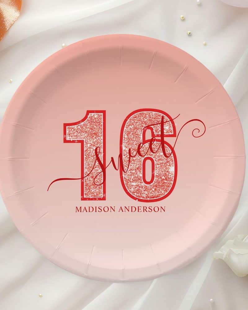 Pink paper plate with red glitter sixteen and Sweet Sixteen text. Madison Anderson is printed below.