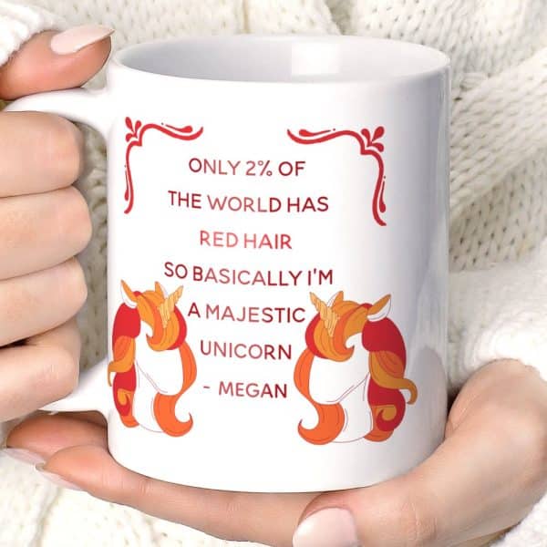 White Coffee Mug Featuring Two Red-Haired Unicorns And Text Stating That Only 2% Of The World Has Red Hair, Making Redheads Majestic Unicorns.